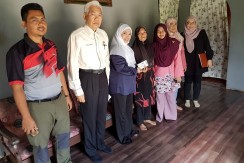 Encik Miswan Tugi
